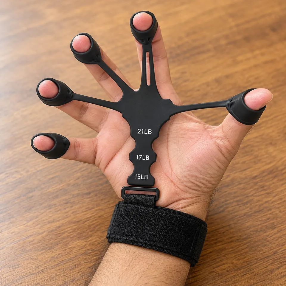 Hand wearing the finger gripper exerciser