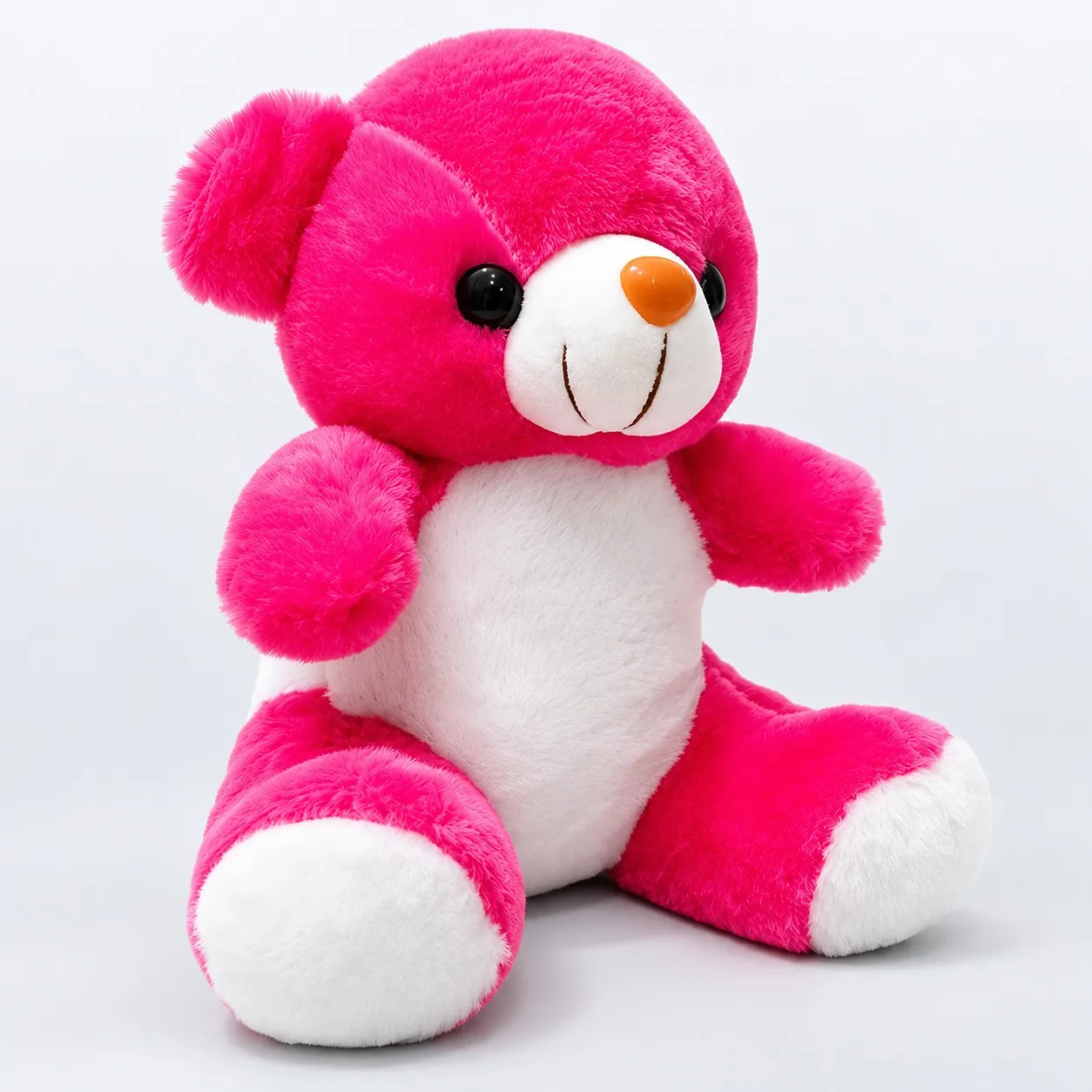 Pink teddy bear, side view