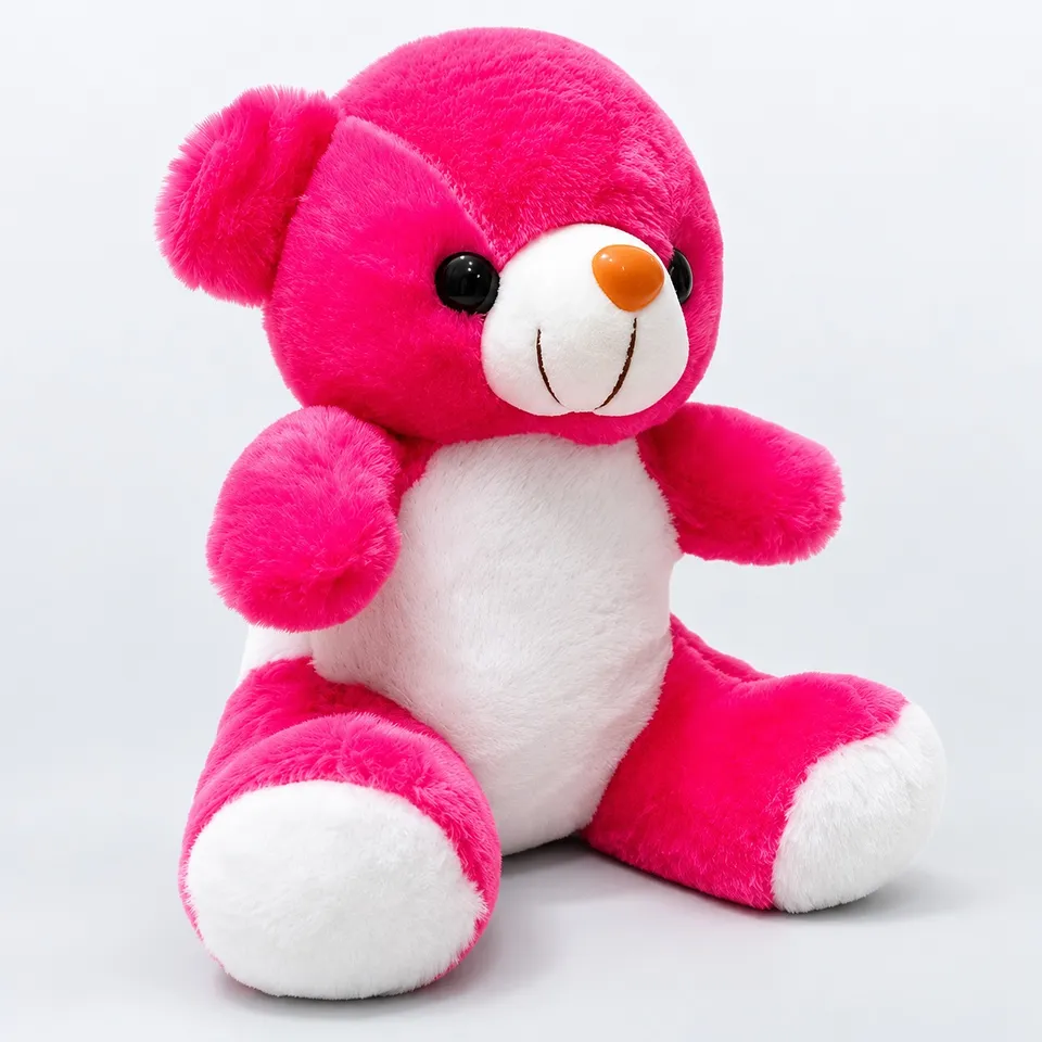 Pink teddy bear, side view