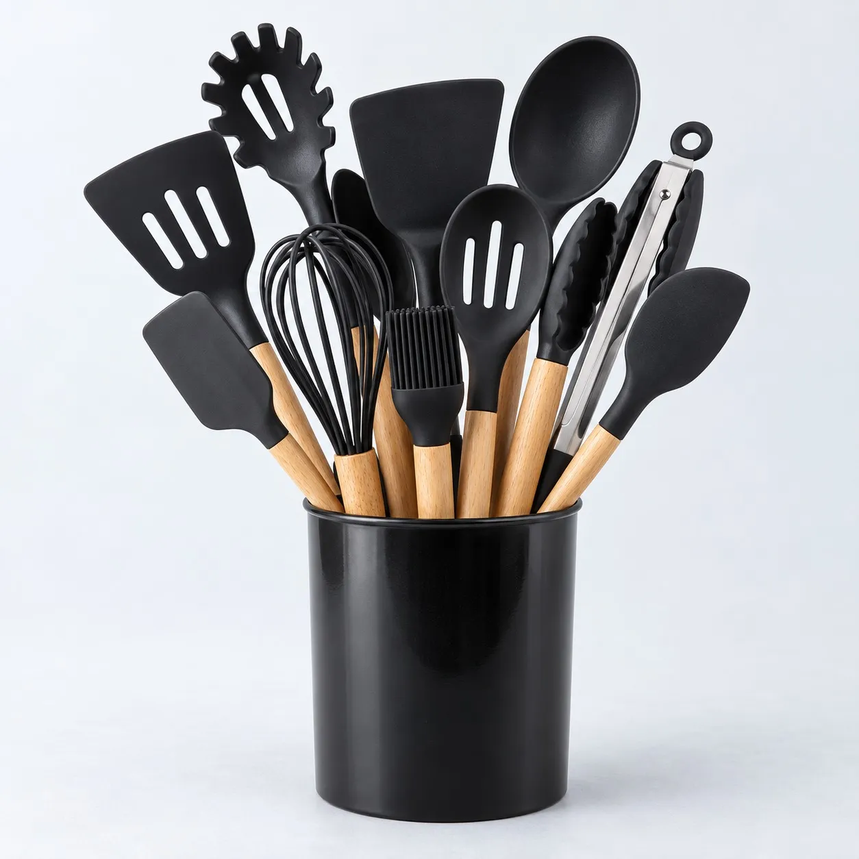 12-piece black silicone utensil set with wooden handles in its holder