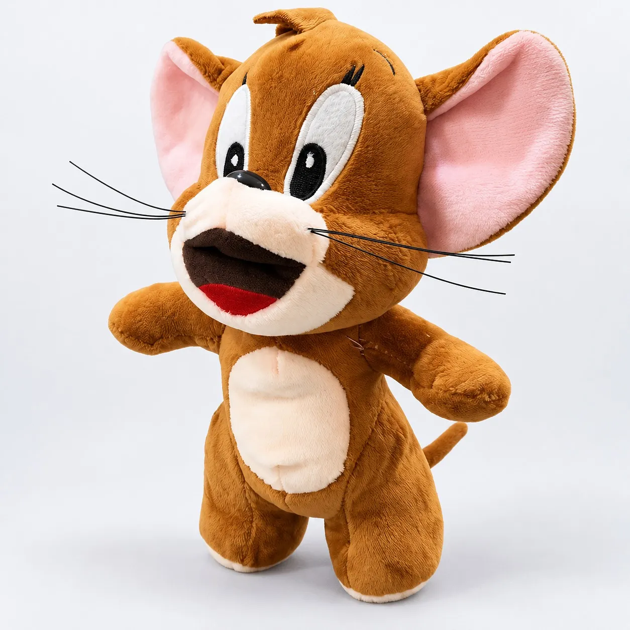 Brown mouse soft toy, side view