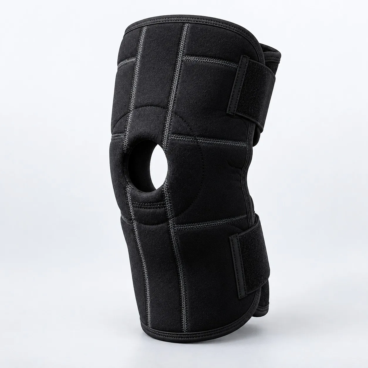 Open patella knee brace wrapped as it is worn