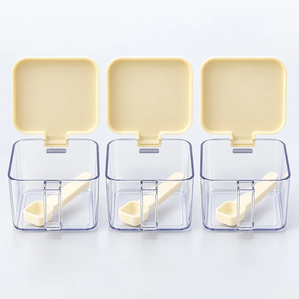 Clear spice boxes with flip lids and spoons