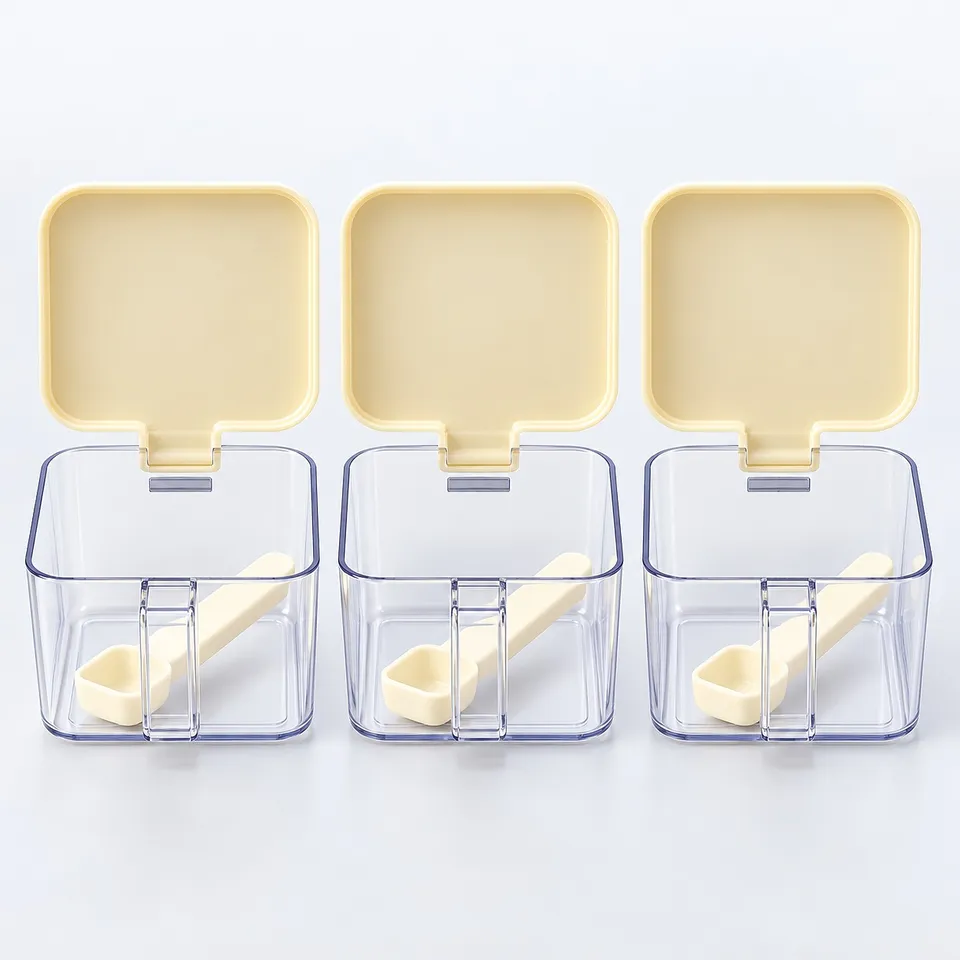 Clear spice boxes with flip lids and spoons