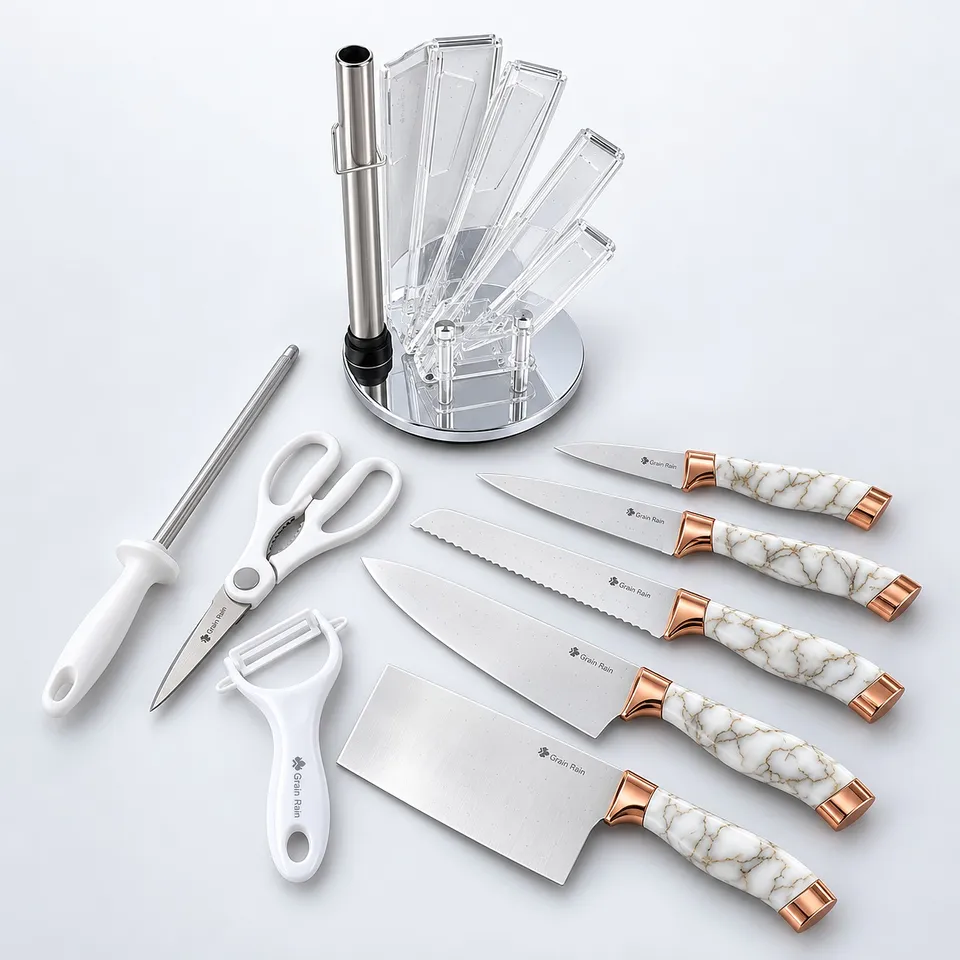 Knives, scissors and peeler from the knife set laid out