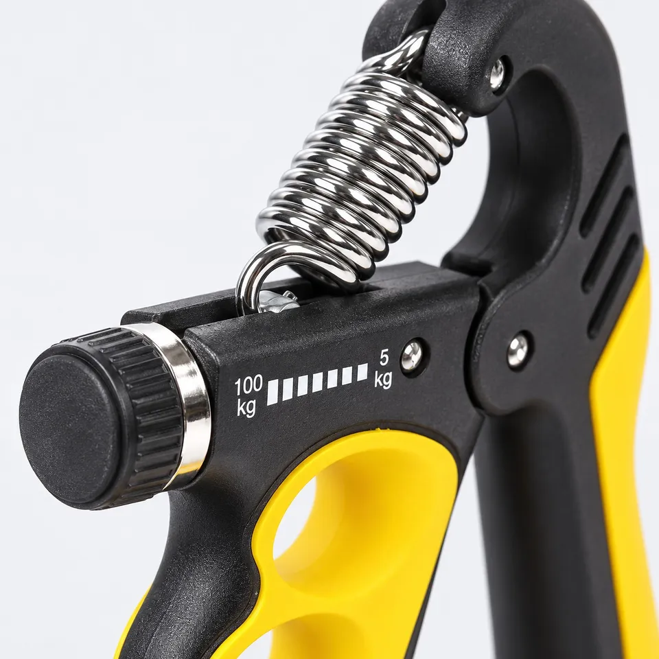 Adjustment knob and kg scale on the hand gripper