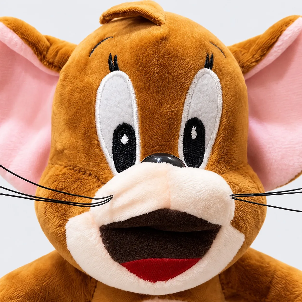 Close-up of the mouse plush toy’s face